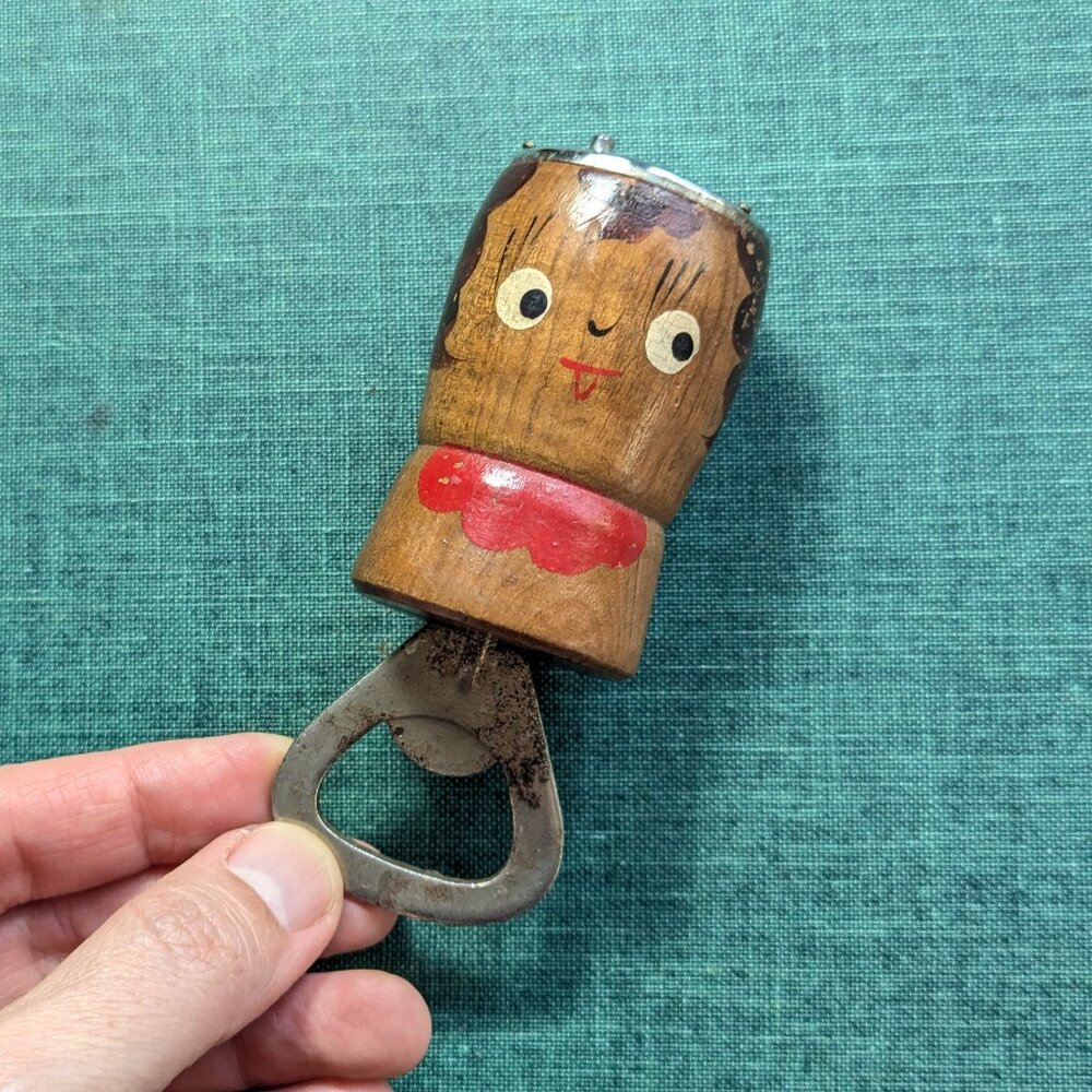 Vintage wood novelty bottle opener and pepper shaker